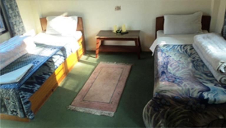 Nepal Guest House Pokhara Rom bilde